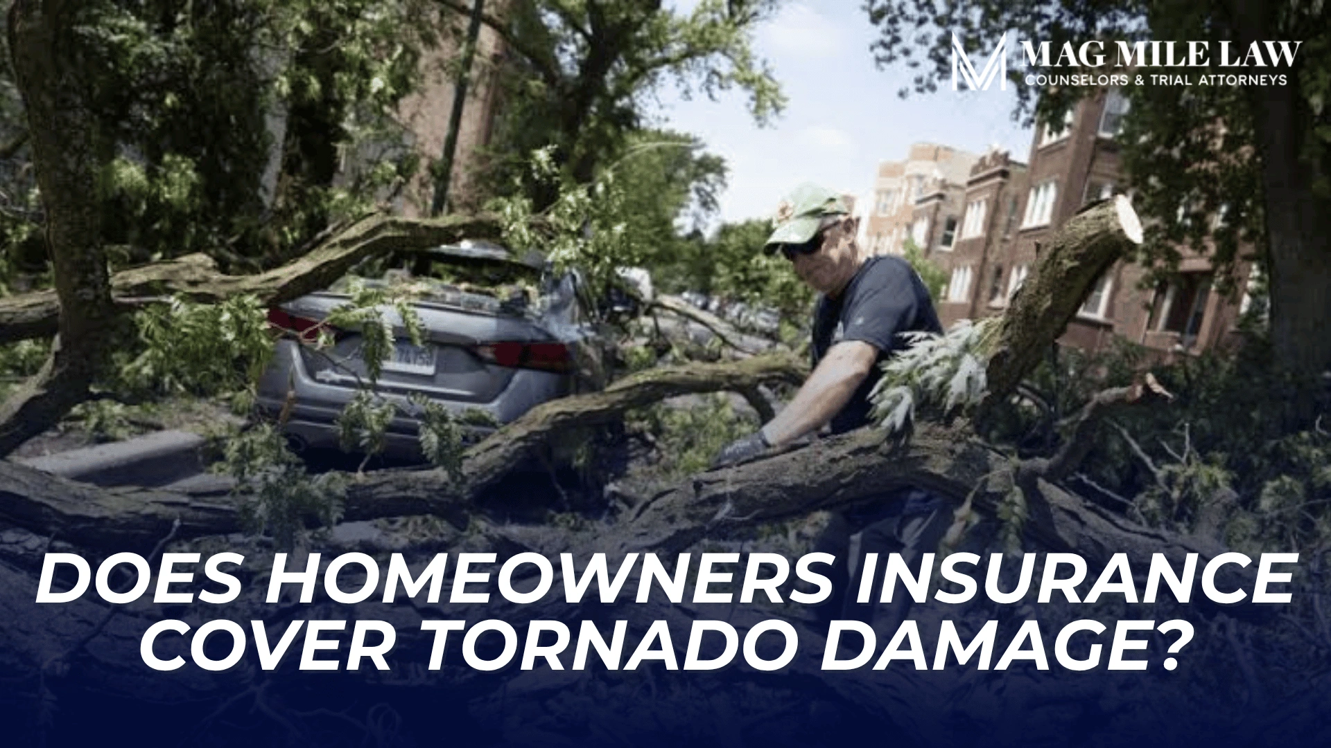 Fallen tree crushes parked cars as worker clears storm damage, introducing tornado insurance coverage.